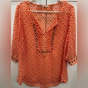 Hawthorn orange geometric blouse with nailhead detail